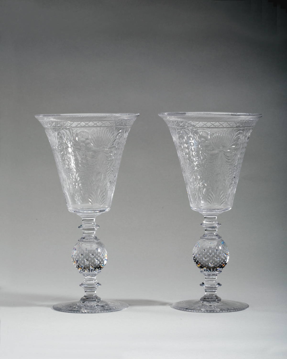 Appraisal: PAIR OF COLORLESS CUT-GLASS VASES EARLY TWENTIETH CENTURY Each cut