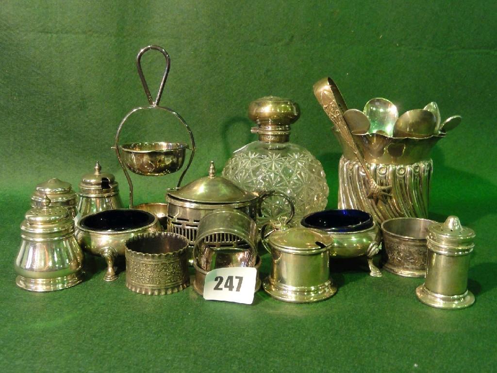 Appraisal: A collection of miscellaneous silverwares including condiments silver topped jar