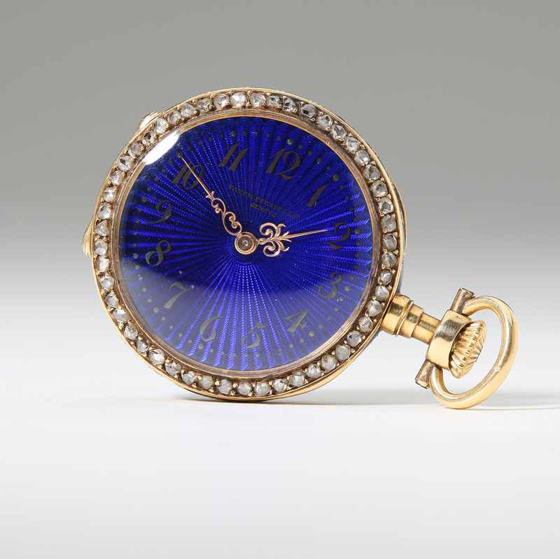 Appraisal: A translucent cobalt blue guilloche enamel dial with gold Arabic