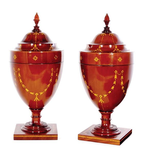 Appraisal: Pair Adam style mahogany and paint-decorated knife urns finial surmounting