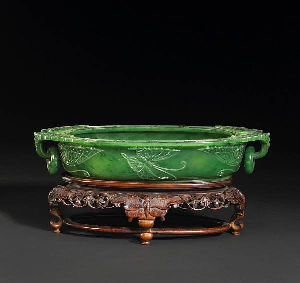 Appraisal: A fine moss green jade marriage bowl Qianlong Mark Of