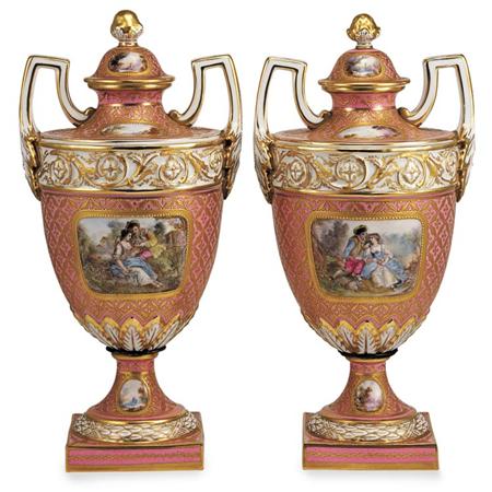 Appraisal: Pair of Continental Gilt Decorated Porcelain Two-Handled Urns Estimate -