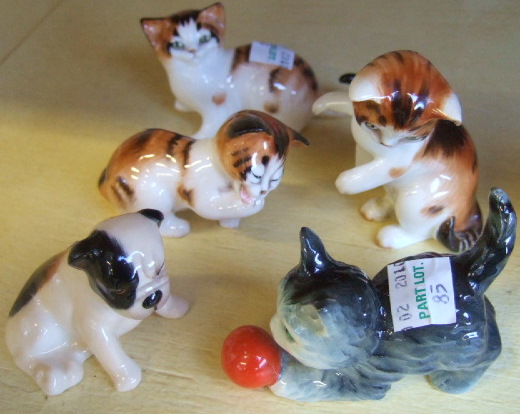 Appraisal: Three Royal Doulton miniature cats a Royal Doulton bull dog