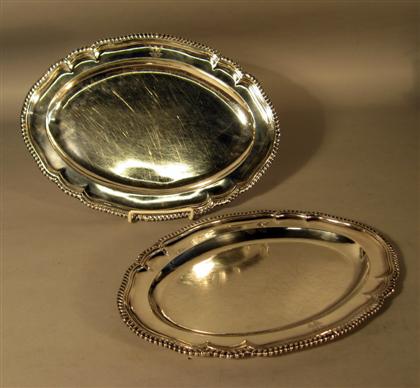 Appraisal: Associated pair of Georgian sterling silver platters maker's mark 'w