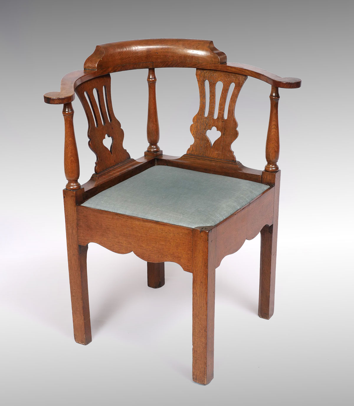 Appraisal: TH CENTURY OAK CORNER CHAIR Circa Oak corner chair upholstered