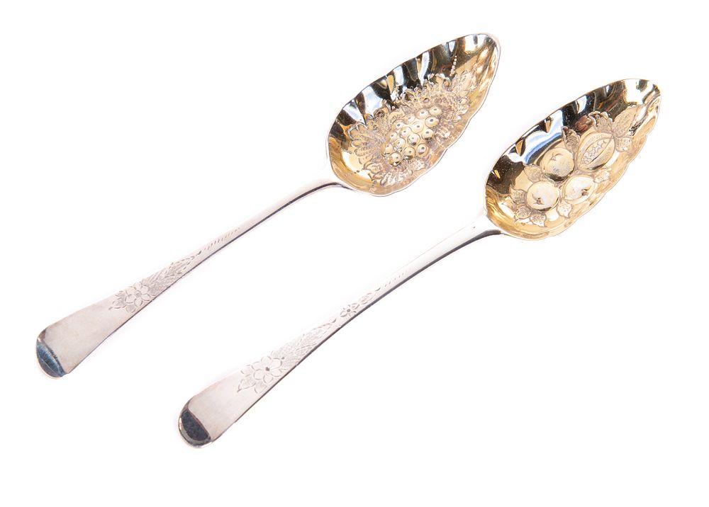 Appraisal: Hallmarked Embossed Silver Serving Spoons Hallmarked Embossed Silver Serving Spoons