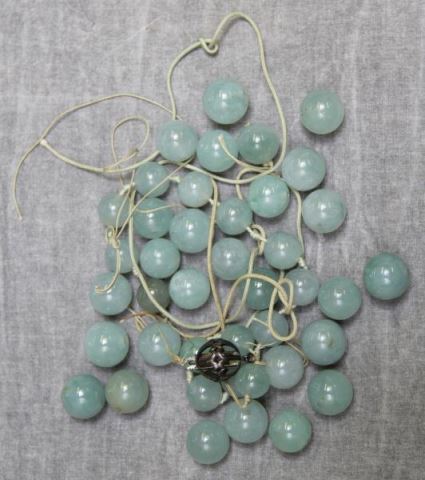 Appraisal: JEWELRY Graduated Chinese Jade Bead Necklace With pierced ball form