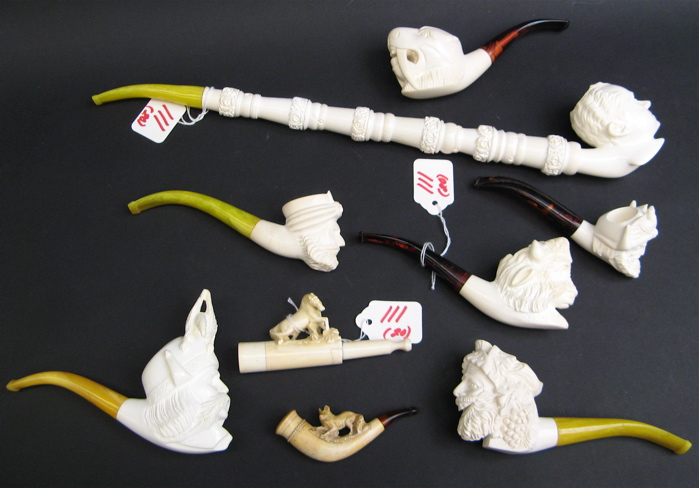 Appraisal: COLLECTION OF NINETEEN TOBACCO PIPES are hand carved meerschaum having