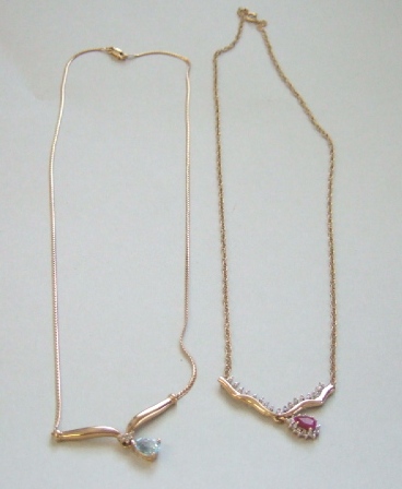 Appraisal: A ct gold ruby and diamond set pendant necklace the