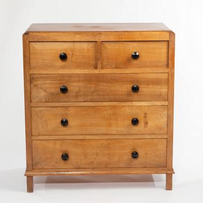 Appraisal: Gordon Russell a walnut chest of drawers fitted three long