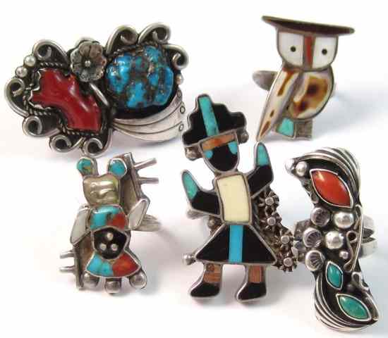 Appraisal: FIVE ZUNI NATIVE AMERICAN SILVER RINGS Three are inlaid with