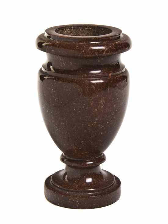 Appraisal: A Porphyry Marble Urn of turned baluster form raised on