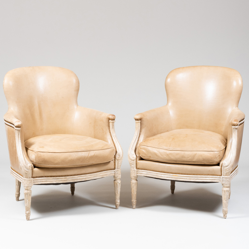 Appraisal: PAIR OF LOUIS XV XVI STYLE PAINTED AND LEATHER UPHOLSTERED