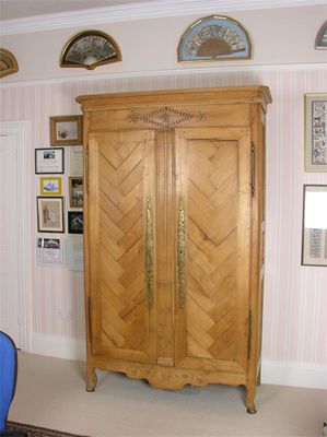 Appraisal: An early th century French elm armoire the moulded cornice