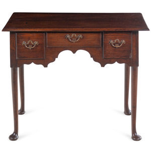 Appraisal: A Queen Anne Carved Oak Dressing Table Circa Height x