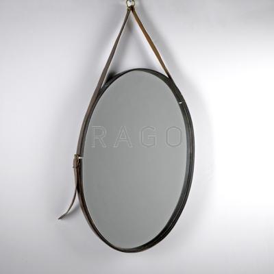 Appraisal: STYLE OF JACQUES ADNET Oval mirror s Mirrored glass leather