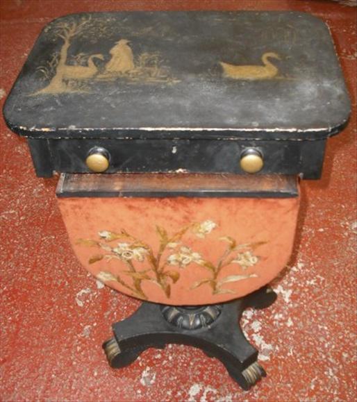 Appraisal: A Victorian ebonised and parcel gilt work table