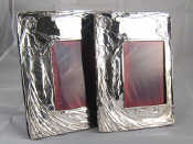 Appraisal: A pair of Art Nouveau style silver photo frames x