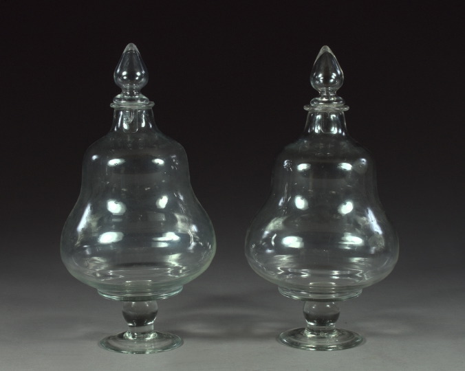 Appraisal: Large Pair of English Footed Clear Glass Apothecary Jars of