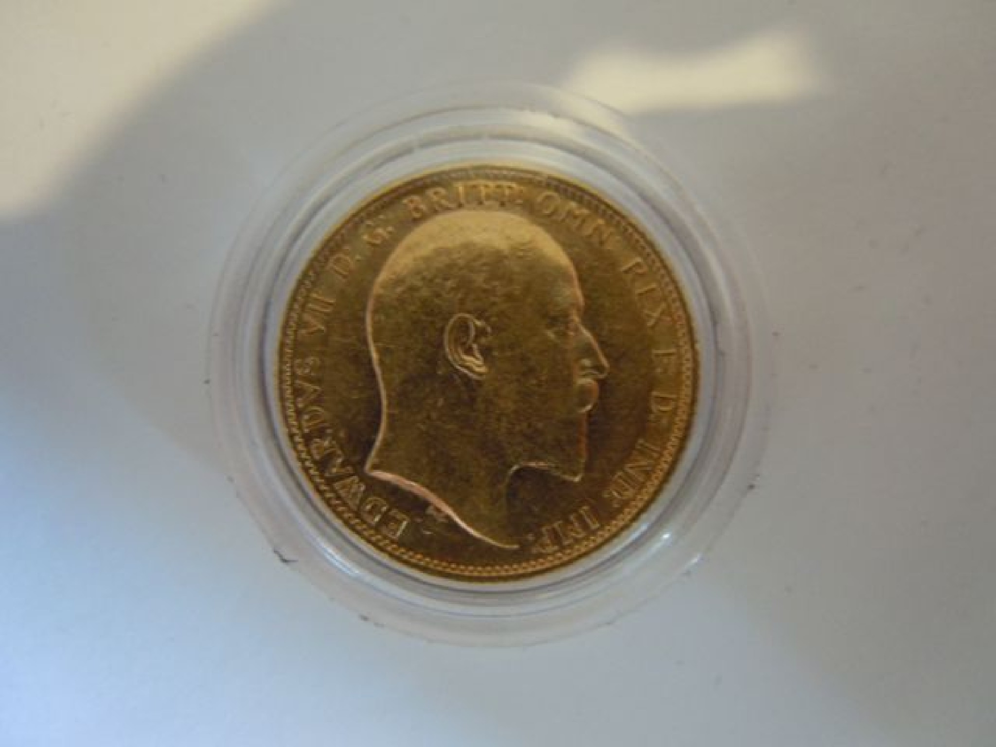 Appraisal: A King Edward VII Coronation Year ct Gold Sovereign fitted