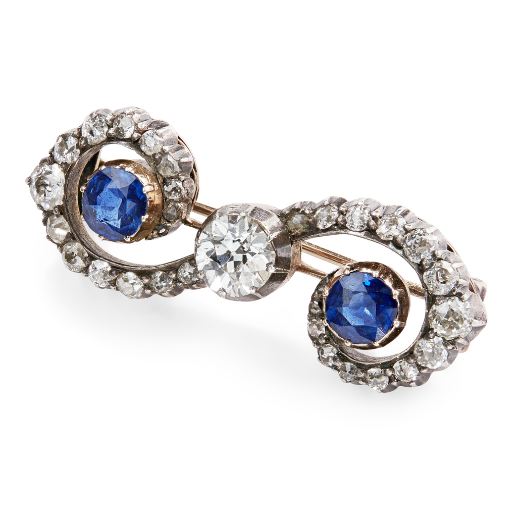 Appraisal: An early th century sapphire and diamond set broochof scrolling