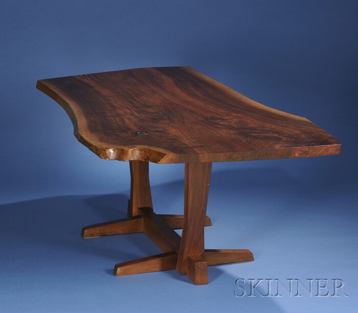 Appraisal: George Nakashima Conoid Dining Table American black walnut and rosewood