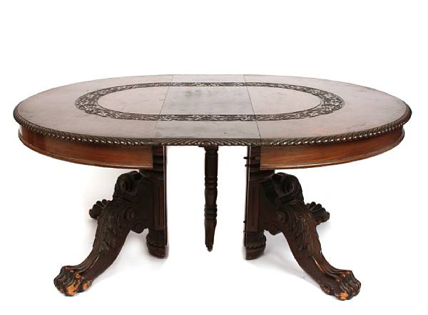 Appraisal: An American carved mahogany dining table circa together with ten