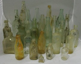 Appraisal: A collection of vintage clear glass jars and bottles including