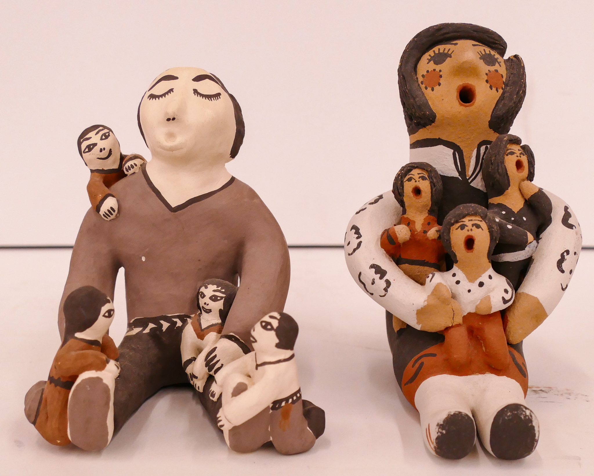 Appraisal: pc Southwest Ceramic Storyteller Figures- ''