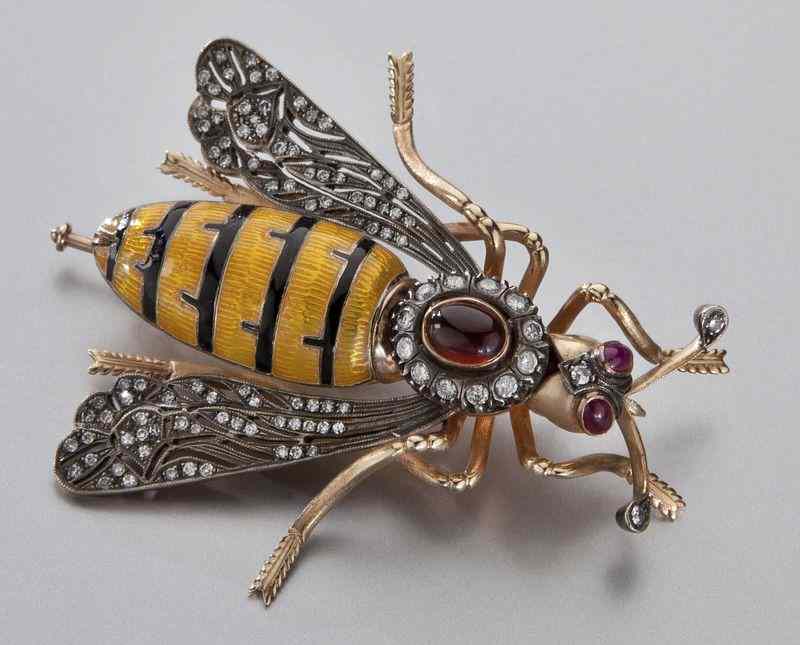 Appraisal: Victorian K diamond ruby and enamel bee broochwith silver overlaid