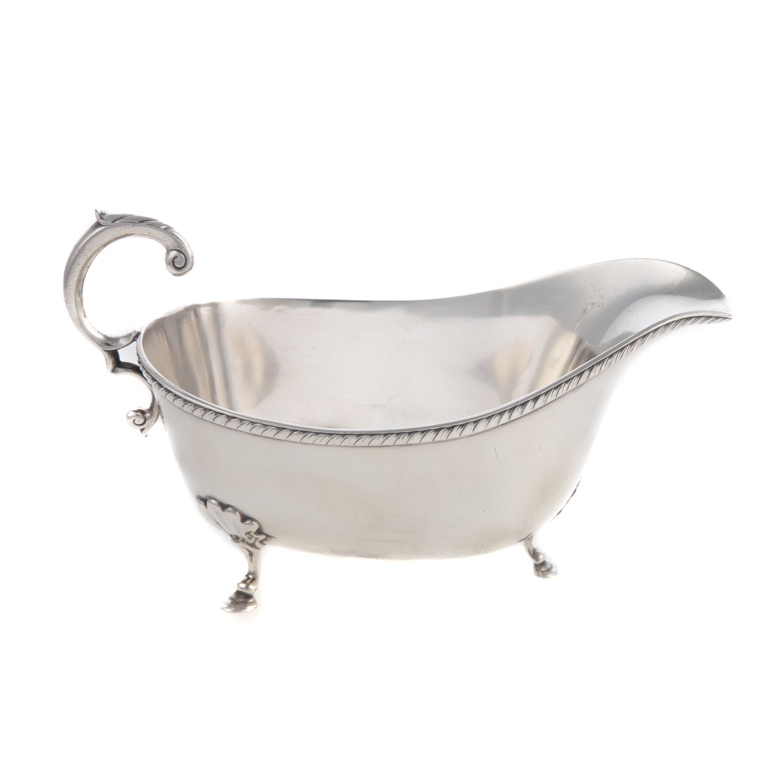 Appraisal: AMERICAN STERLING SILVER SAUCEBOAT Typical form with gadrooned border foliate-capped