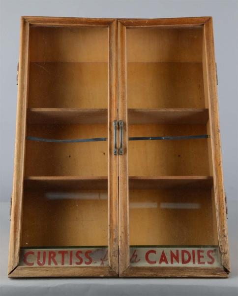 Appraisal: Curtiss Candies Display Case Double door slanted display case Bottom