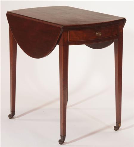 Appraisal: A George III oval mahogany Pembroke table the crossbanded top