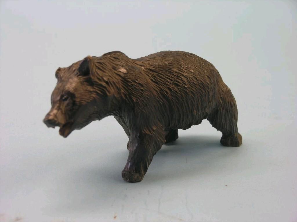 Appraisal: A th century Swiss carved wood bear model standing four-square