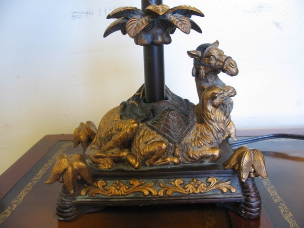 Appraisal: A SPELTER FIGURAL DECORATOR'S LAMP having cold painted figures of