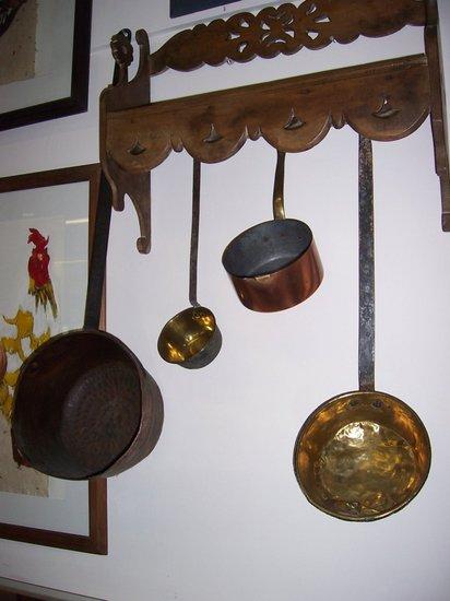 Appraisal: Two copper and two brass saucepans cm long and smaller