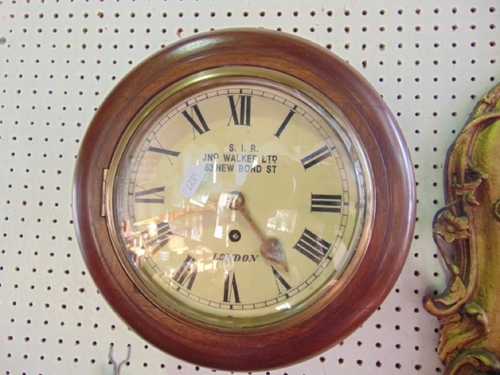 Appraisal: A mahogany dial clock with single train fusee movement the