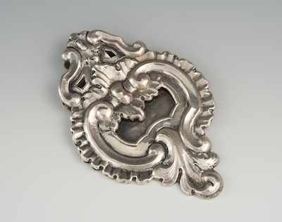 Appraisal: An Silver Desk Clip In a rococo inspired relief form