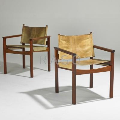 Appraisal: DANISH Pair of armchairs s Rosewood and stitched leather Unmarked