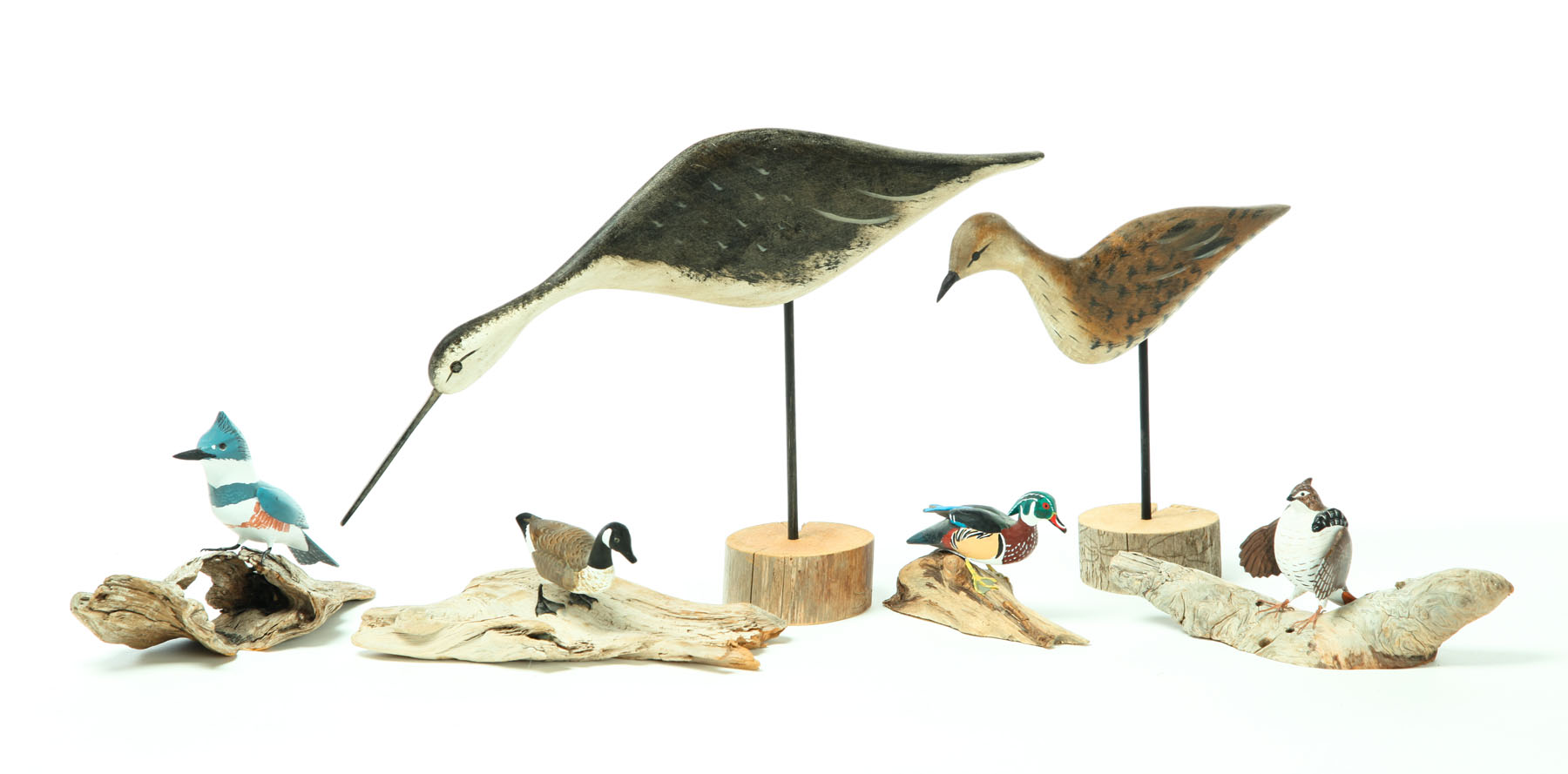 Appraisal: SIX CONTEMPORARY FOLK ART WOODEN CARVED BIRDS American nd half-