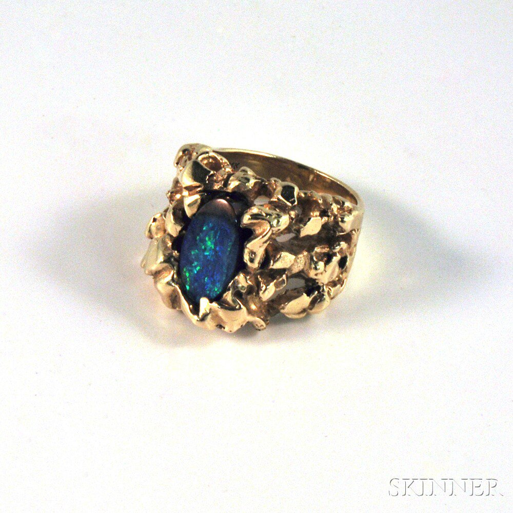 Appraisal: Modern kt Gold and Opal Ring the heavy textured gold