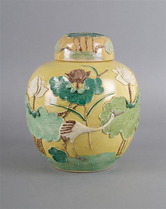 Appraisal: A Chinese Yellow Glazed Stoneware Storage Jar Height inches