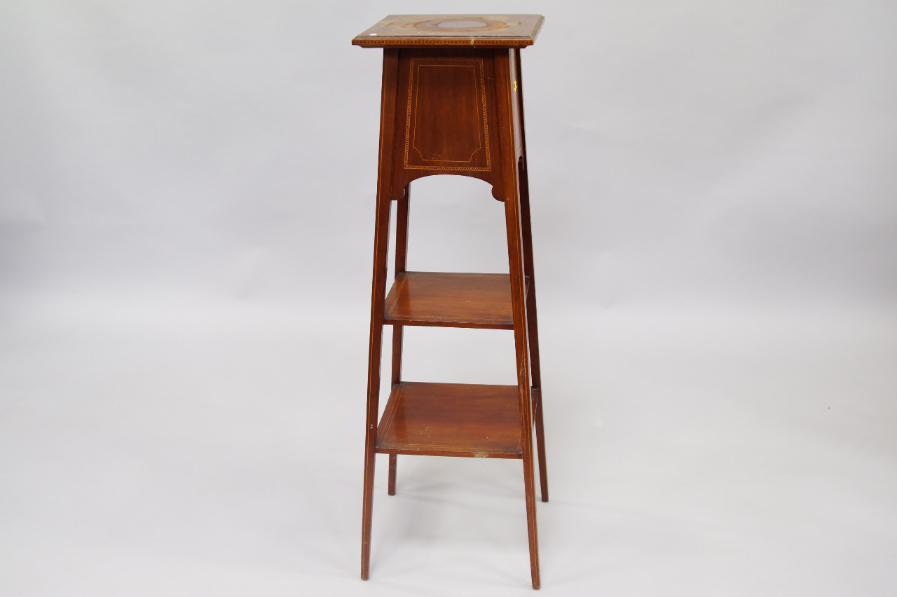 Appraisal: An Edwardian mahogany and inlaid jardiniere stand of square section