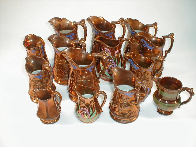 Appraisal: Ten randomly graduated Victorian copper lustre moulded jugs and four