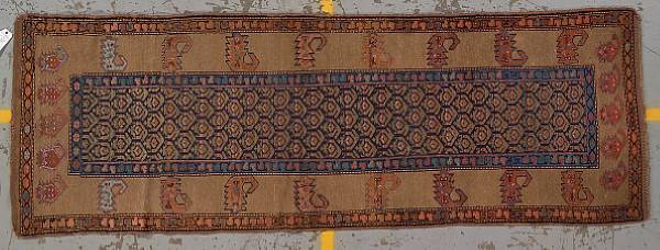 Appraisal: A Northwest Persian runner Northwest Persia size approximately ft in