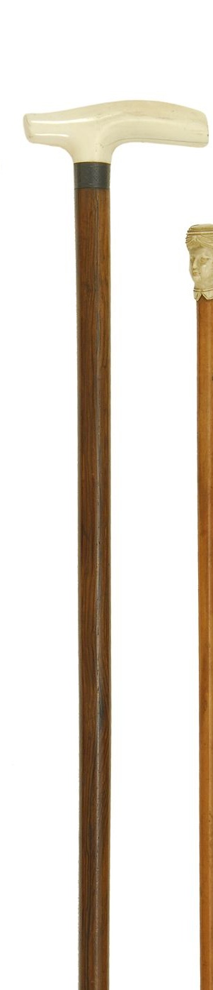 Appraisal: ROSEWOOD AND IVORY CANE th CenturyWith carved ivory handle and