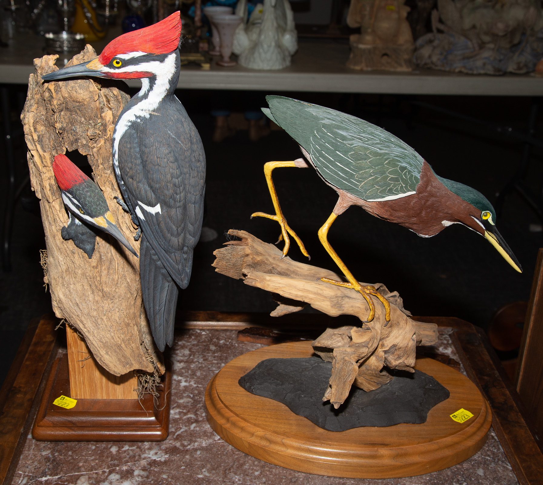 Appraisal: TWO SIGNED CARVED WOOD BIRD FIGURES Including a Pileated Woodpecker