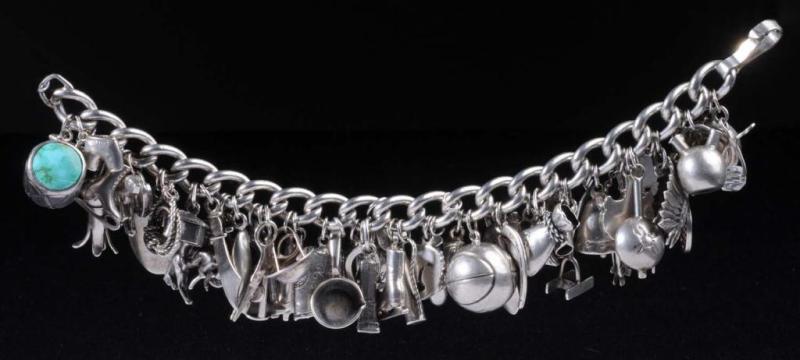 Appraisal: Sterling Silver Charm Bracelet with Charms Condition Excellent Size L