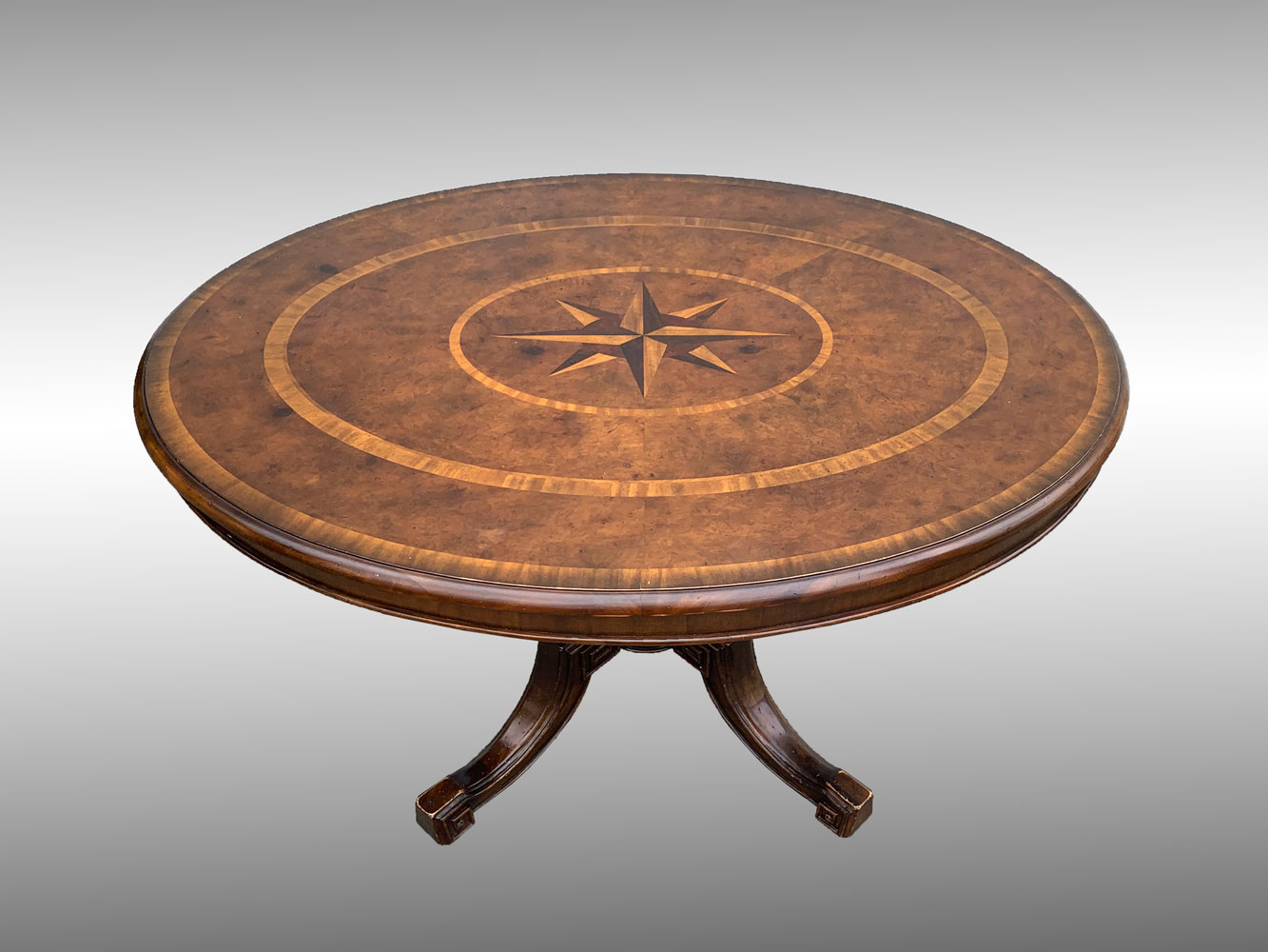 Appraisal: JOHN RICHARDSON PARQUETRY COMPASS TABLE Oval table top having a