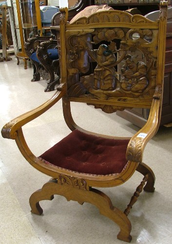 Appraisal: CARVED SAVONAROLA ARMCHAIR Italian Chinese influence American early th century